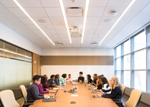 Team meeting around a table in a modern conference room